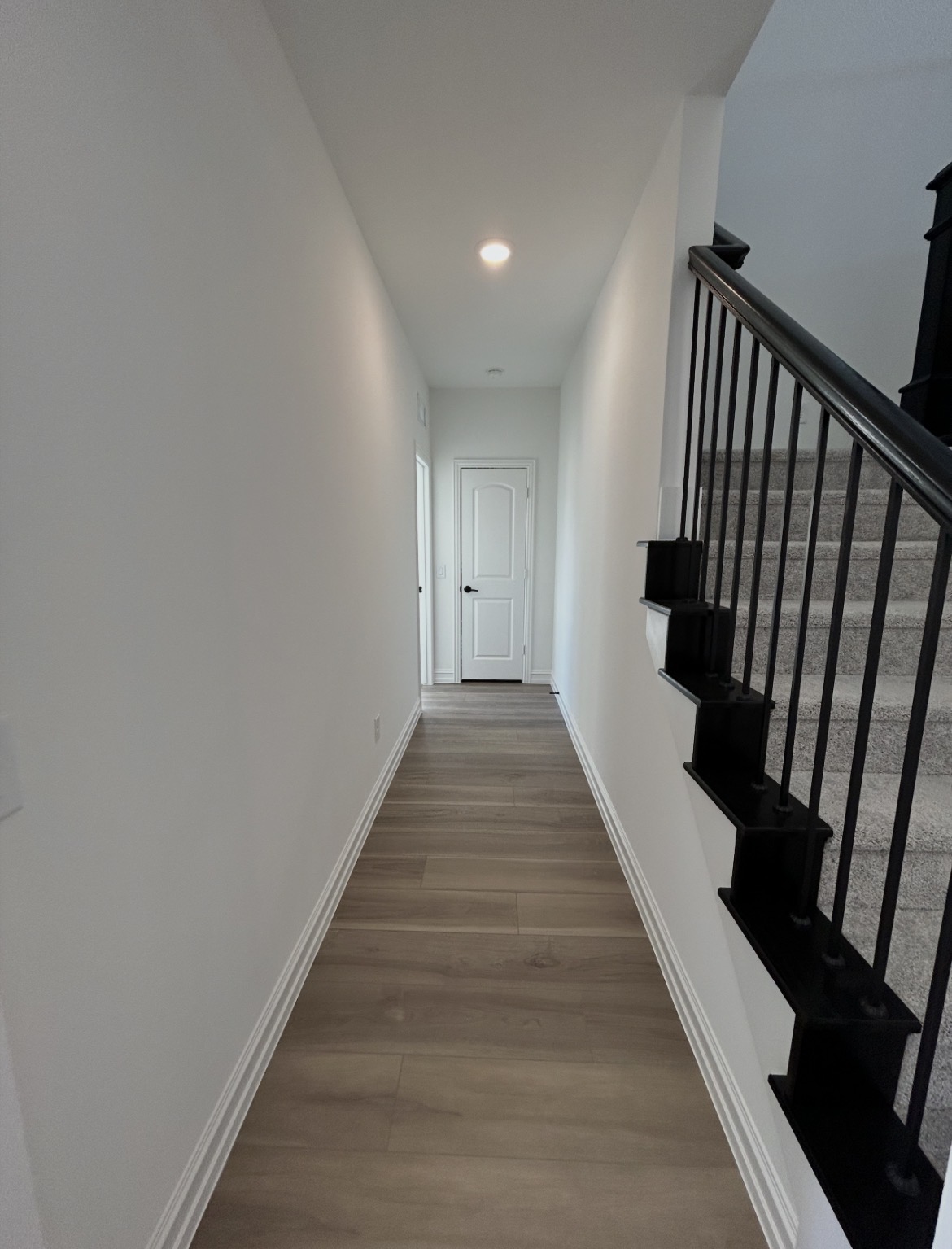 Clean painted hallway and staircase